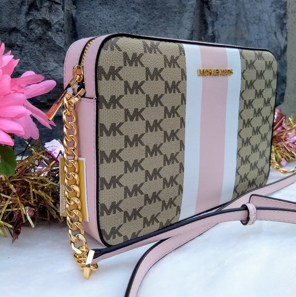 Michael Kors Handbags - 🌸Michael Kors Jet Set Center Stripe Crossbody Bag